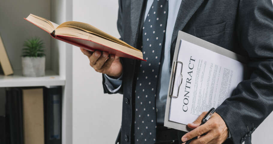 businessman-holding book clipboard with contract